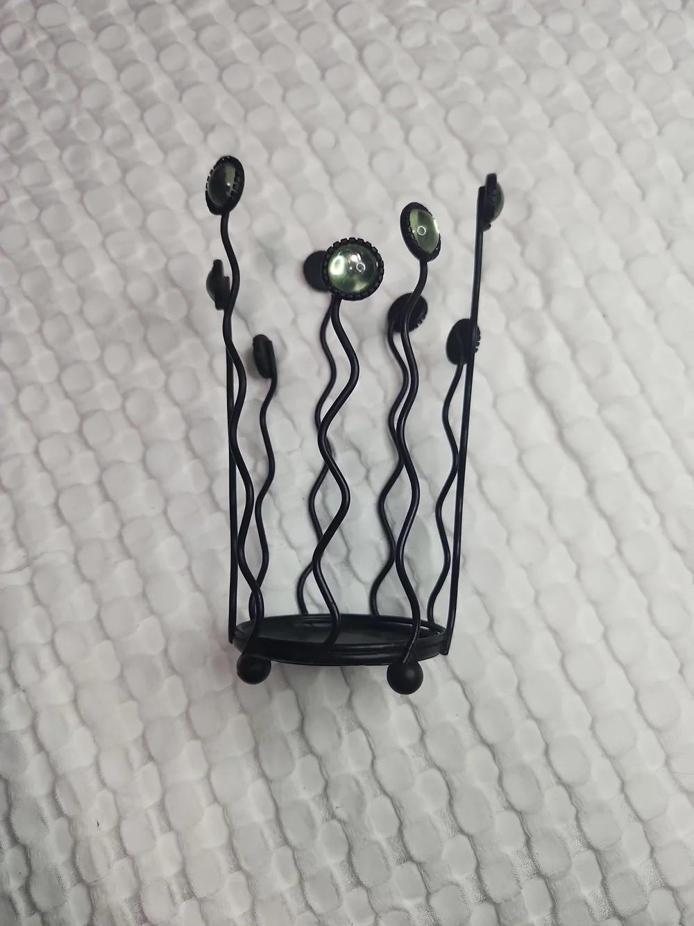 Wavy Black Metal Candle Holder with Green Glass Accents